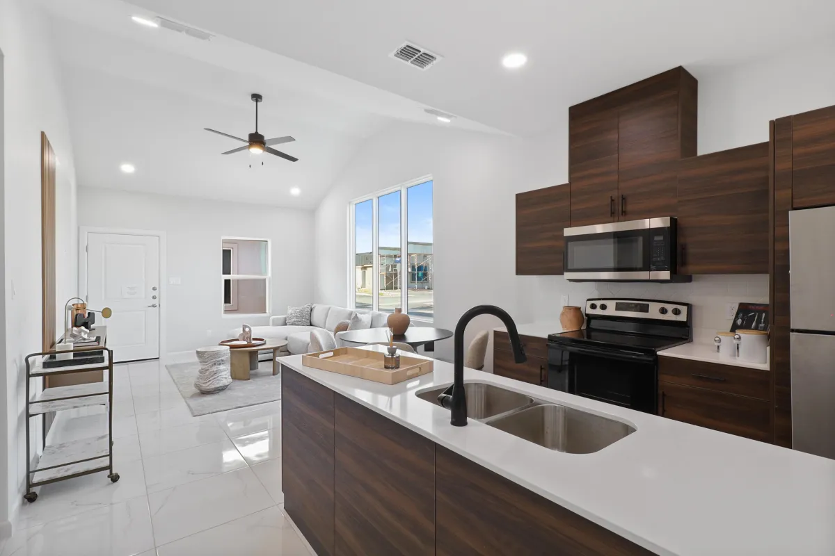 Modern condo kitchen with stainless steel appliances